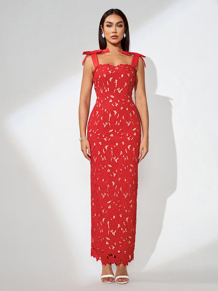 Embroidered floral dress with thin straps and cut-out details for an elegant look