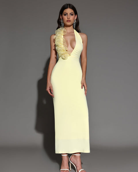 Elegant halter neck maxi dress with ruffles and deep neckline