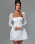 Short satin dress with lace sleeves in A-line style