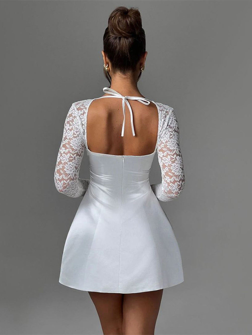 Short satin dress with lace sleeves in A-line style