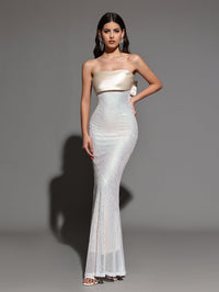 Magnolia Bellamy — Long Sequin Dress with Backless Design and Bow Knot