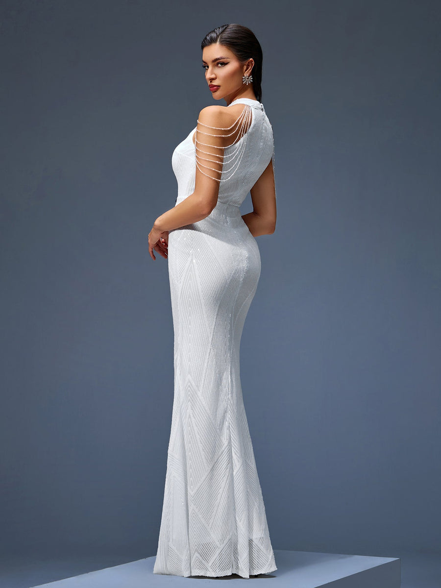 Elegant evening gown with beaded chain and fringe