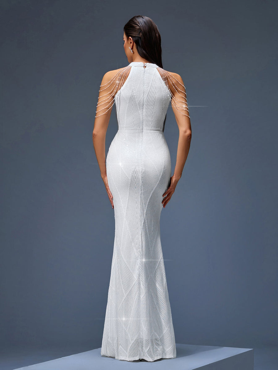 Elegant evening gown with beaded chain and fringe