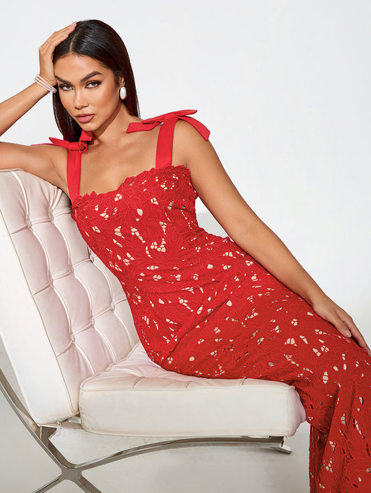 Embroidered floral dress with thin straps and cut-out details for an elegant look