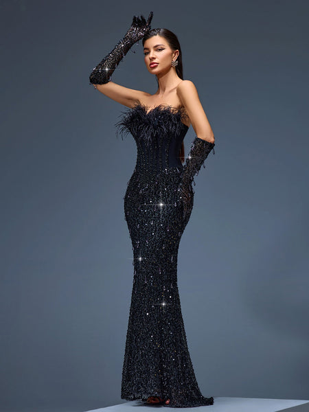 Elegant evening gown with sequin corset, feather details, and matching gloves