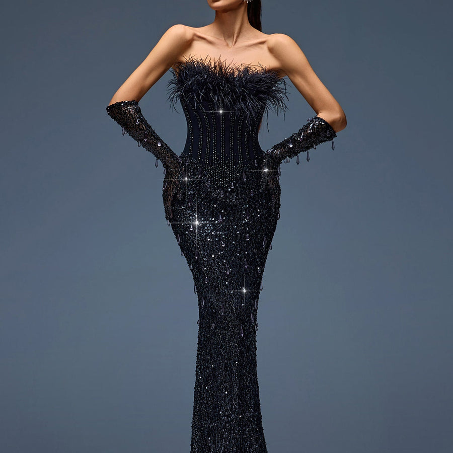 Elegant evening gown with sequin corset, feather details, and matching gloves