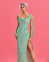 Chic long sequin dress with off-the-shoulder design and high slit