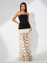Noémie Bellamy — Elegant Polka Dot Spliced Maxi Dress for a Chic and Sophisticated Look