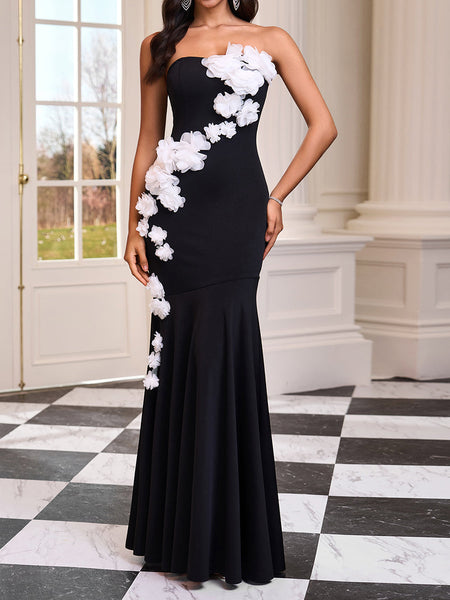 Long strapless dress with 3D flowers and a mermaid hemline