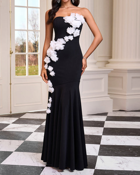 Long strapless dress with 3D flowers and a mermaid hemline