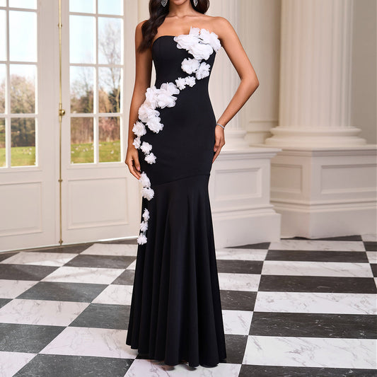 Long strapless dress with 3D flowers and a mermaid hemline