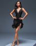 Elegant bandage dress with pearls and feathers for a sophisticated look