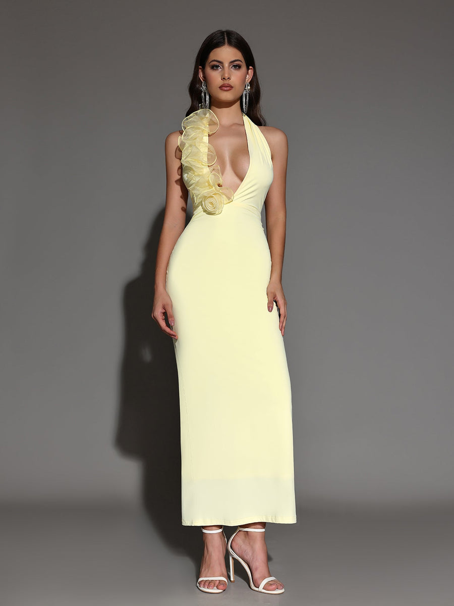 Elegant halter neck maxi dress with ruffles and deep neckline