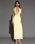 Elegant halter neck maxi dress with ruffles and deep neckline