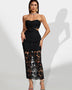 Long sleeveless dress with floral details and lace on the back