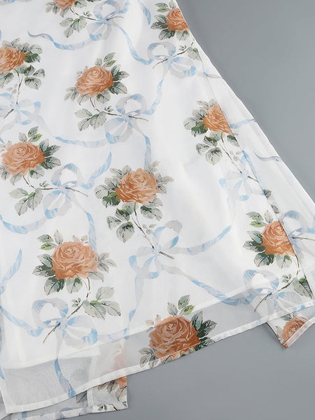 Geblümtes Schlitzkleid mit Spitzenbesatz