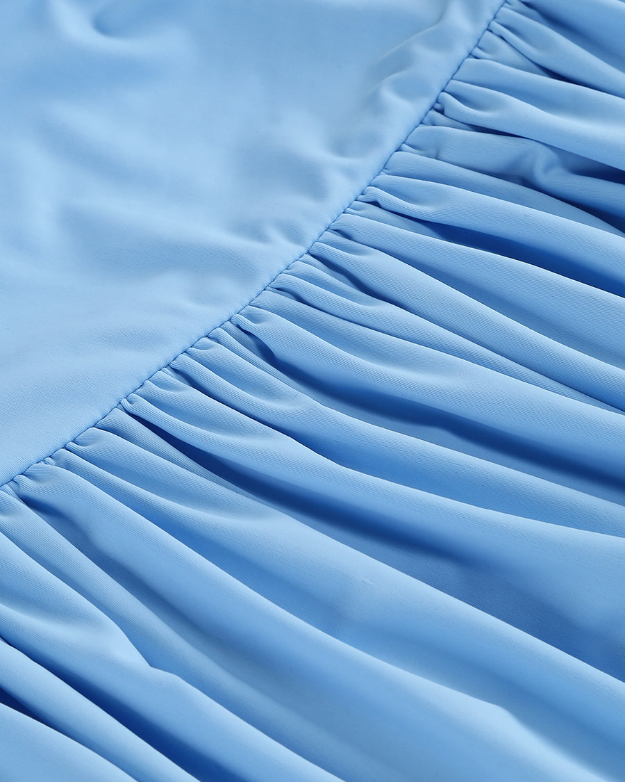 Maxikleid mit schräger Schulter und Raffungen