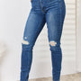 Judy Blue Full Size Mid Waist Distressed Slim Jeans - Opulent EmpireJudy Blue Full Size Mid Waist Distressed Slim JeansOpulent Empire