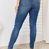 Judy Blue Full Size Mid Waist Distressed Slim Jeans - Opulent EmpireJudy Blue Full Size Mid Waist Distressed Slim JeansOpulent Empire