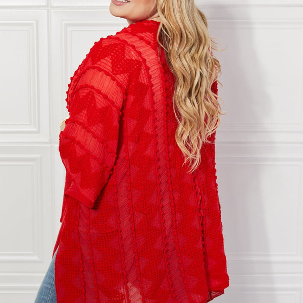 Justin Taylor Pom-Pom Asymmetrical Poncho Cardigan in Red - Opulent EmpireJustin Taylor Pom-Pom Asymmetrical Poncho Cardigan in RedOpulent EmpireClothing