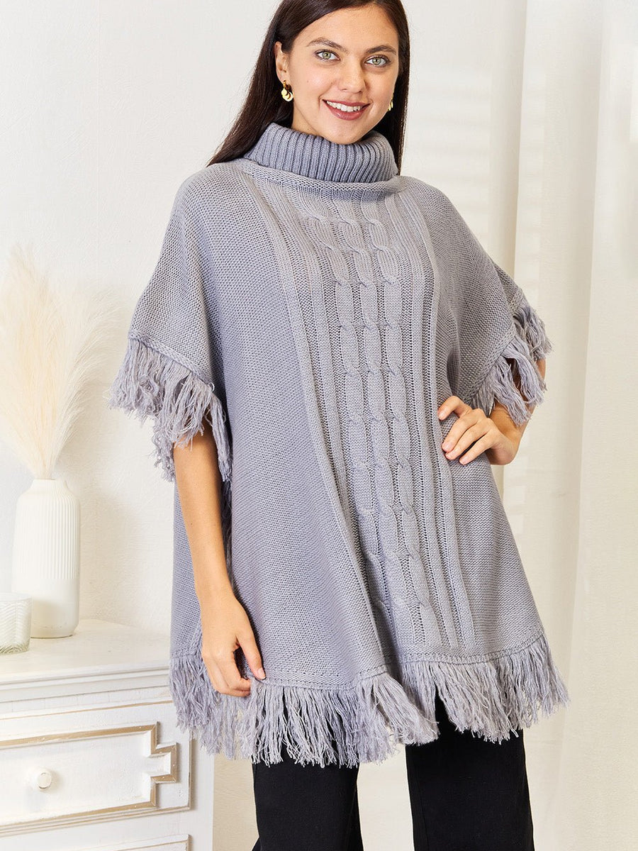 Justin Taylor Turtle Neck Fringe Poncho - Opulent EmpireJustin Taylor Turtle Neck Fringe PonchoOpulent Empire