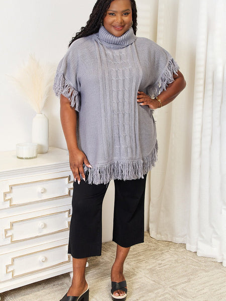 Justin Taylor Turtle Neck Fringe Poncho - Opulent EmpireJustin Taylor Turtle Neck Fringe PonchoOpulent Empire