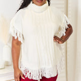 Justin Taylor Turtle Neck Fringe Poncho - Opulent EmpireJustin Taylor Turtle Neck Fringe PonchoOpulent Empire