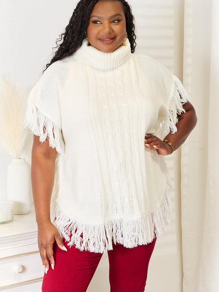 Justin Taylor Turtle Neck Fringe Poncho - Opulent EmpireJustin Taylor Turtle Neck Fringe PonchoOpulent Empire