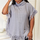 Justin Taylor Turtle Neck Fringe Poncho - Opulent EmpireJustin Taylor Turtle Neck Fringe PonchoOpulent Empire