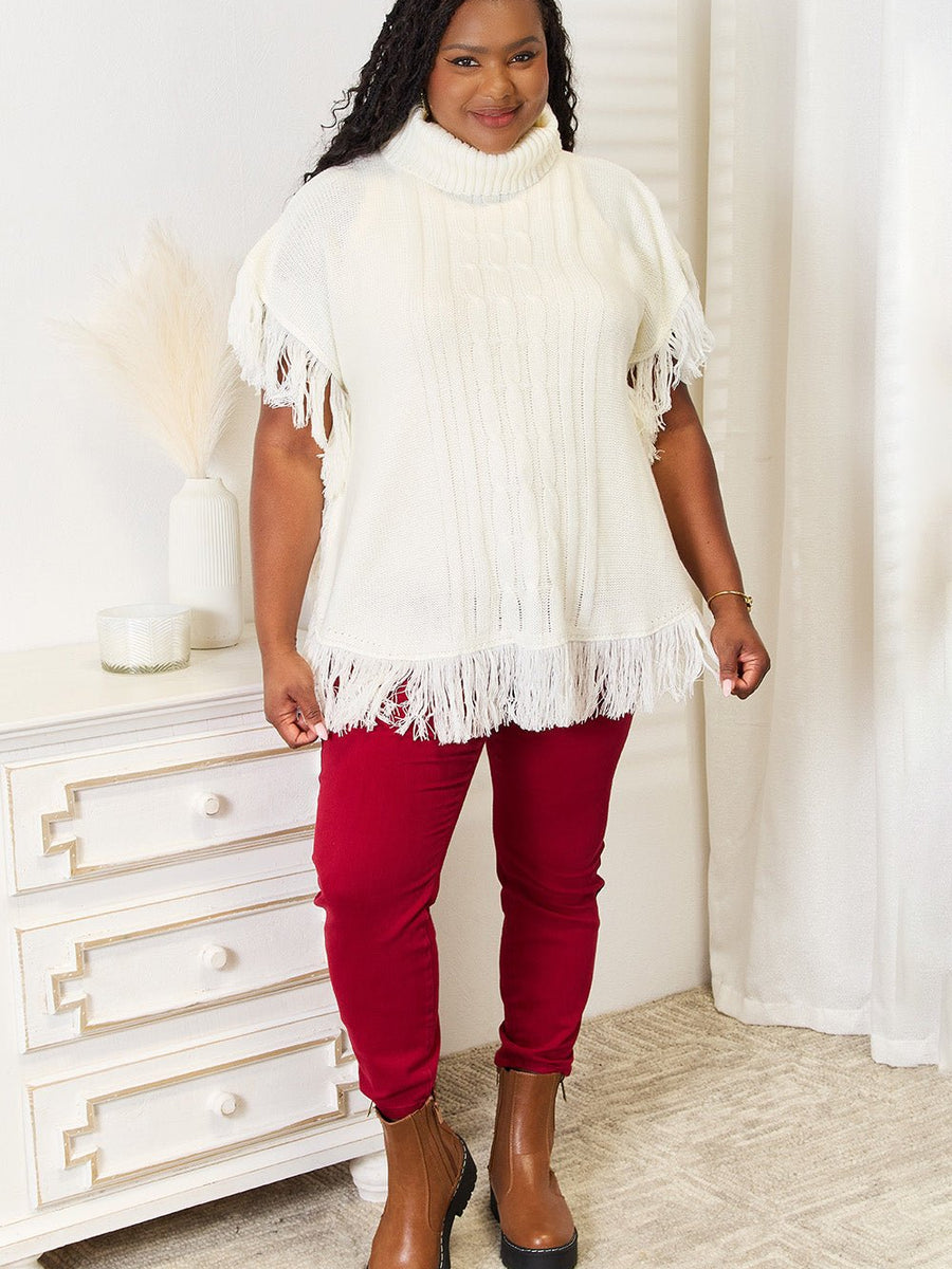 Justin Taylor Turtle Neck Fringe Poncho - Opulent EmpireJustin Taylor Turtle Neck Fringe PonchoOpulent Empire