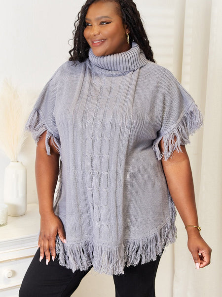 Justin Taylor Turtle Neck Fringe Poncho - Opulent EmpireJustin Taylor Turtle Neck Fringe PonchoOpulent Empire