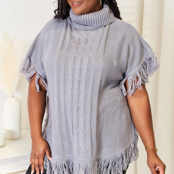 Justin Taylor Turtle Neck Fringe Poncho - Opulent EmpireJustin Taylor Turtle Neck Fringe PonchoOpulent Empire