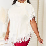 Justin Taylor Turtle Neck Fringe Poncho - Opulent EmpireJustin Taylor Turtle Neck Fringe PonchoOpulent Empire