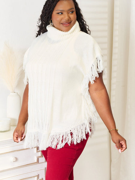 Justin Taylor Turtle Neck Fringe Poncho - Opulent EmpireJustin Taylor Turtle Neck Fringe PonchoOpulent Empire