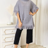 Justin Taylor Turtle Neck Fringe Poncho - Opulent EmpireJustin Taylor Turtle Neck Fringe PonchoOpulent Empire