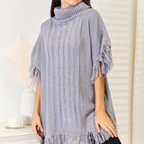 Justin Taylor Turtle Neck Fringe Poncho - Opulent EmpireJustin Taylor Turtle Neck Fringe PonchoOpulent Empire