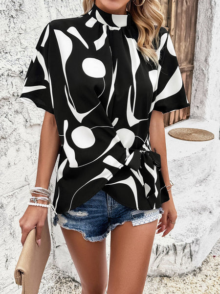 Tied Printed Mock Neck Half Sleeve Blouse - Opulent EmpireTied Printed Mock Neck Half Sleeve BlouseOpulent Empire