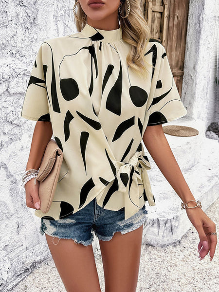 Tied Printed Mock Neck Half Sleeve Blouse - Opulent EmpireTied Printed Mock Neck Half Sleeve BlouseOpulent Empire