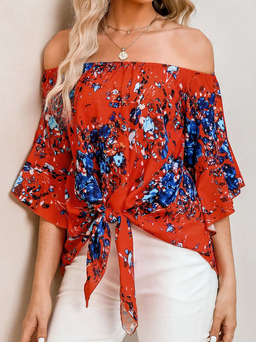 Tied Printed Off-Shoulder Half Sleeve Blouse - Opulent EmpireTied Printed Off-Shoulder Half Sleeve BlouseOpulent Empire