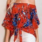 Tied Printed Off-Shoulder Half Sleeve Blouse - Opulent EmpireTied Printed Off-Shoulder Half Sleeve BlouseOpulent Empire