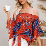 Tied Printed Off-Shoulder Half Sleeve Blouse - Opulent EmpireTied Printed Off-Shoulder Half Sleeve BlouseOpulent Empire